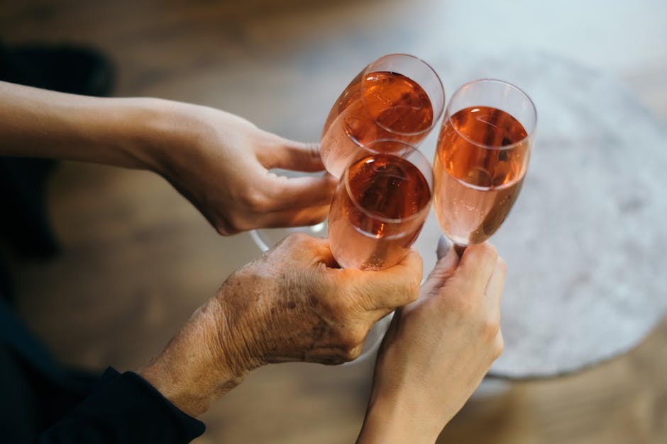 Champagne glasses toast at a social event